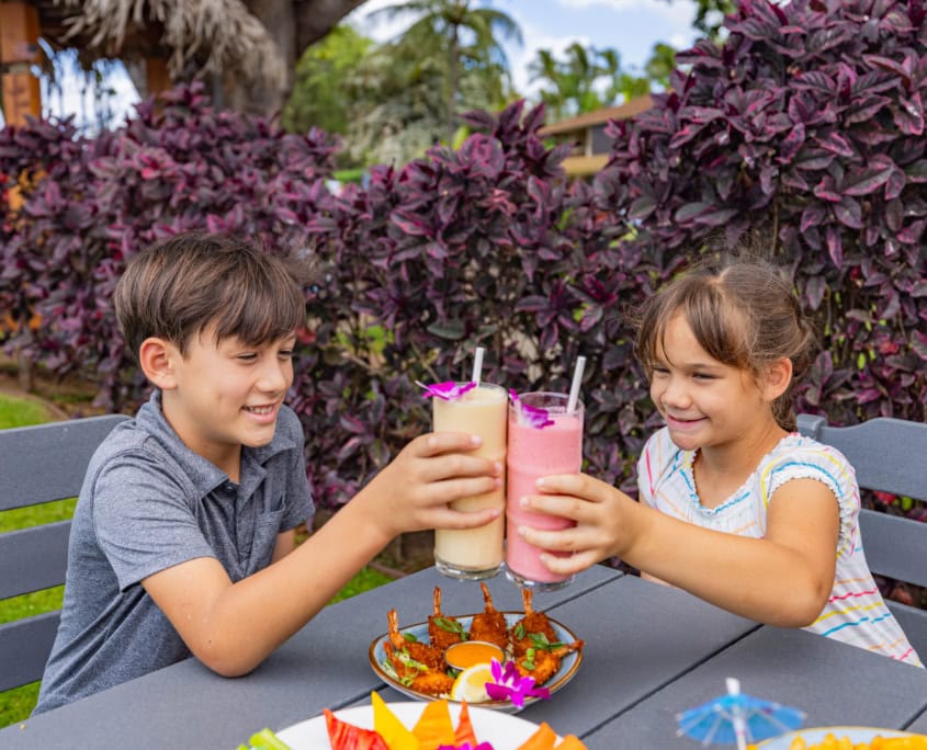 Castaway Cafe kids holding smoothies