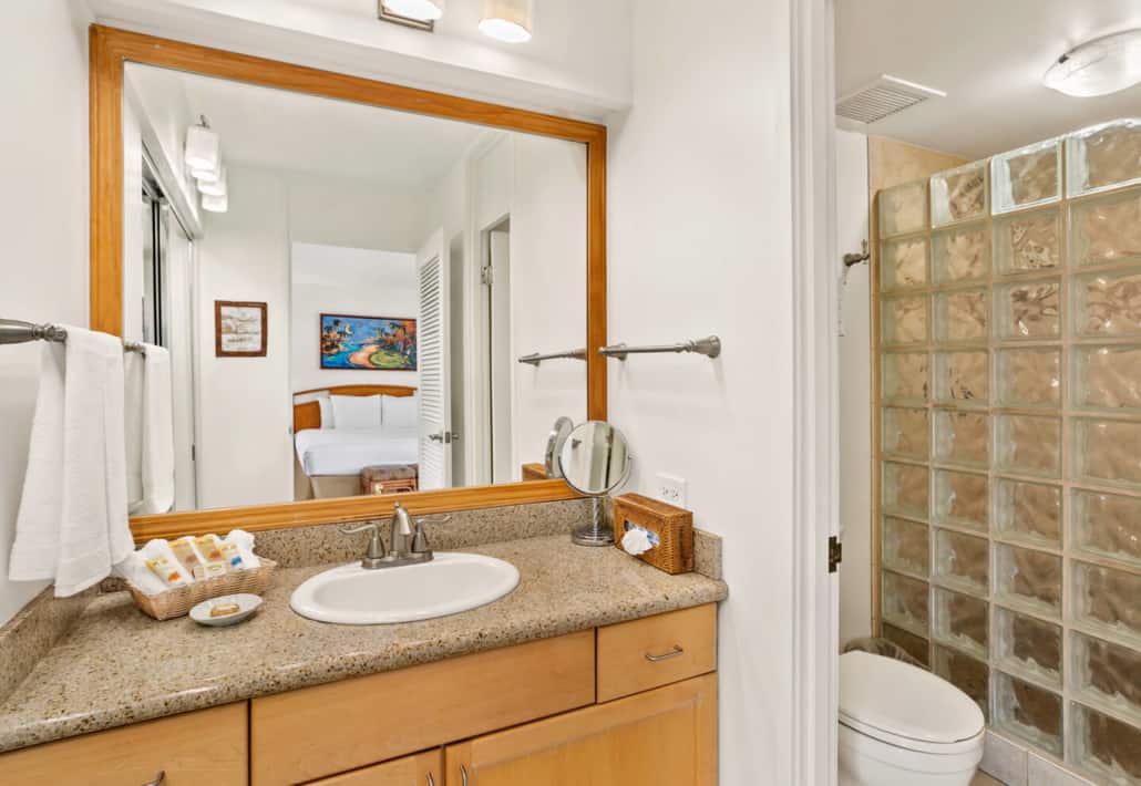 walk-in shower with a large miror