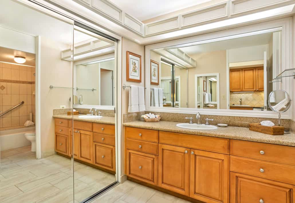 bathroom with tub/shower combo separate space for the basin area with a large mirror