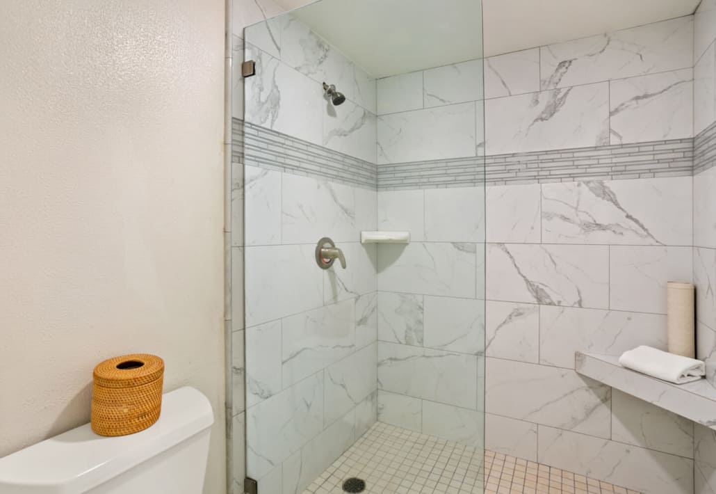 walk in shower in the bathroom