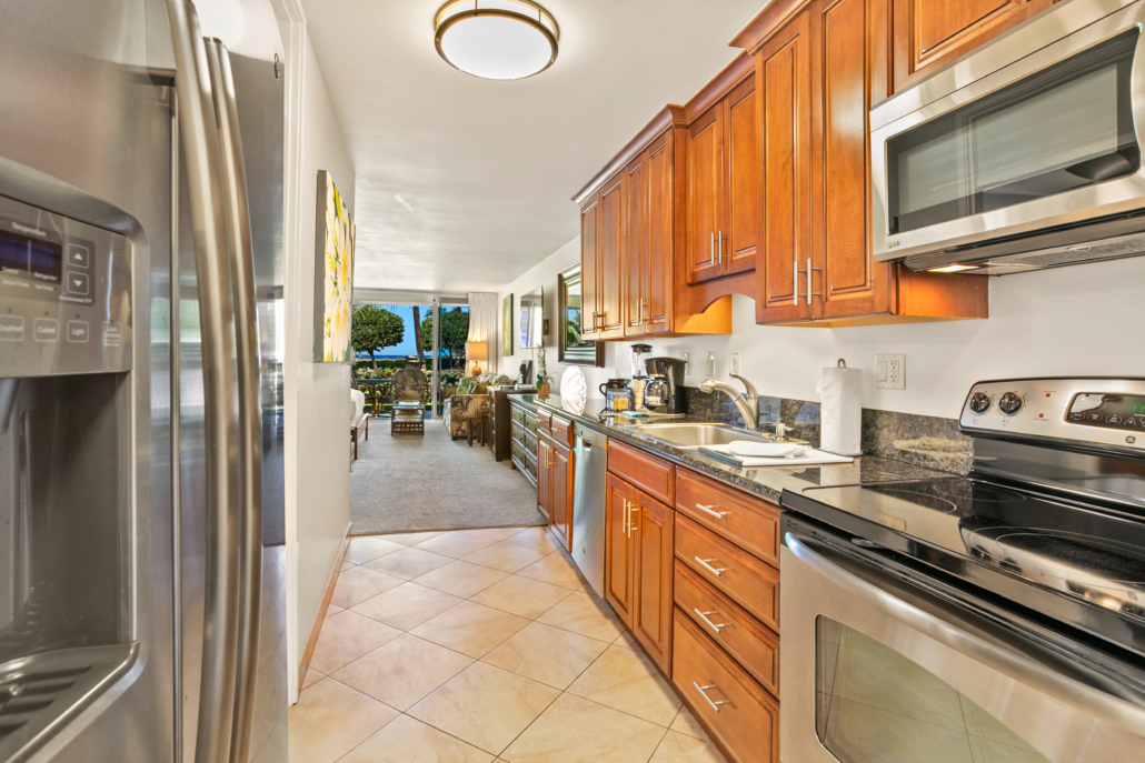 kitchen with full-size refrigerator, stove, microwave and dishwather