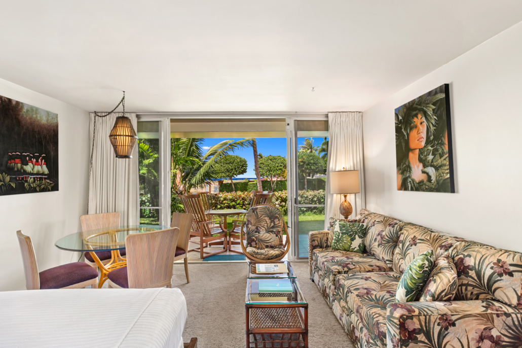 studio with separate seating with a coffee table, seperate dining and private lanai with seating